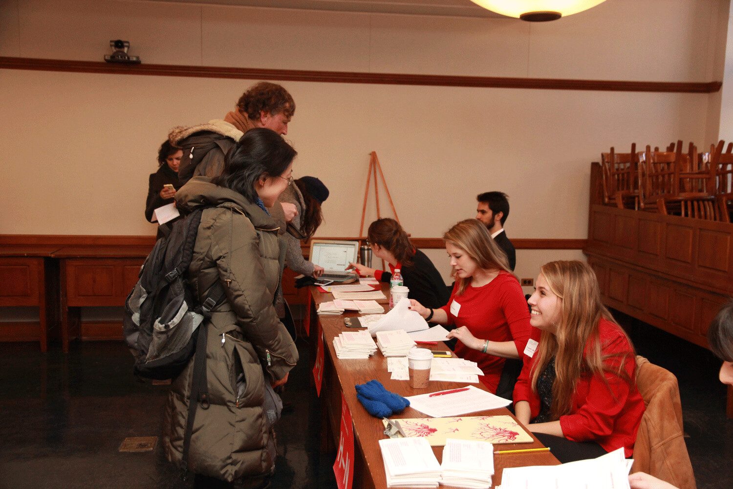 Guests checking in at the registration table